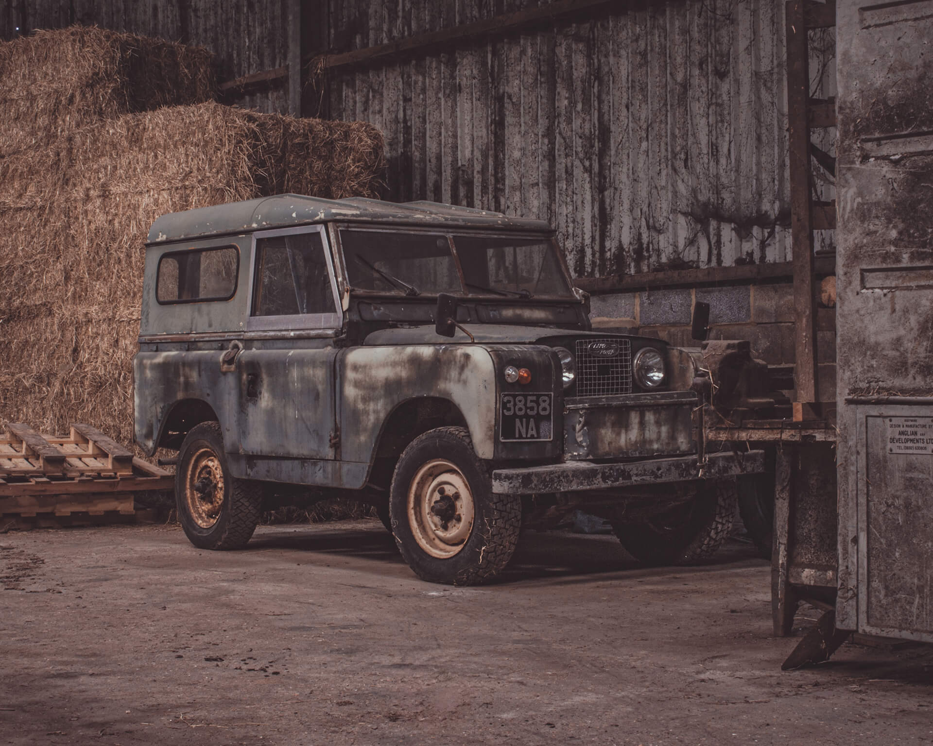 Land Rover Series II in a barn before restoration