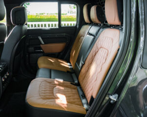 Custom tan leather rear seats in a new Land Rover Defender 110
