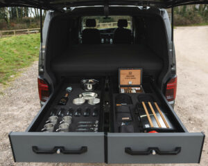 Top dual storage drawers in a VW Transporter